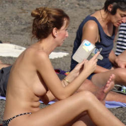 Pic #6 Reading Topless On The Beach - Big Tits, Outdoors, Beach Voyeur