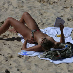 Pic #5 A Young Lady Reading Topless - Topless Girls, Beach, Outdoors, Medium Tits, Beach Voyeur