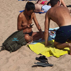 Pic #2 not 1 but 2 different asian girls topless on beach