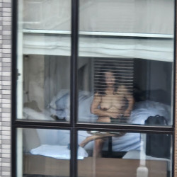 Pic #2 Chinese mature lady naked at hotel window