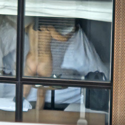 Pic #4 Chinese mature lady naked at hotel window