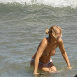 Pic #2 Into the waves - Beach, Beach Pussy, Beach Voyeur, Blonde, Hard Nipples, Medium Tits, Nature, Outdoors, Public Exhibitionist, Public Place, Round Tits, Topless Amateurs, Topless Wives