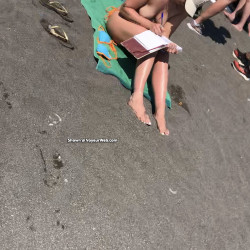 Only one topless on busy beach - Beach, Beach Pussy, Beach Voyeur, Brunette, Lingerie, Outdoors, Public Exhibitionist, Public Place, Topless Amateurs, Topless Girls, Young Woman