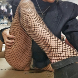 Cute tush in fishnets to interrupt your workday